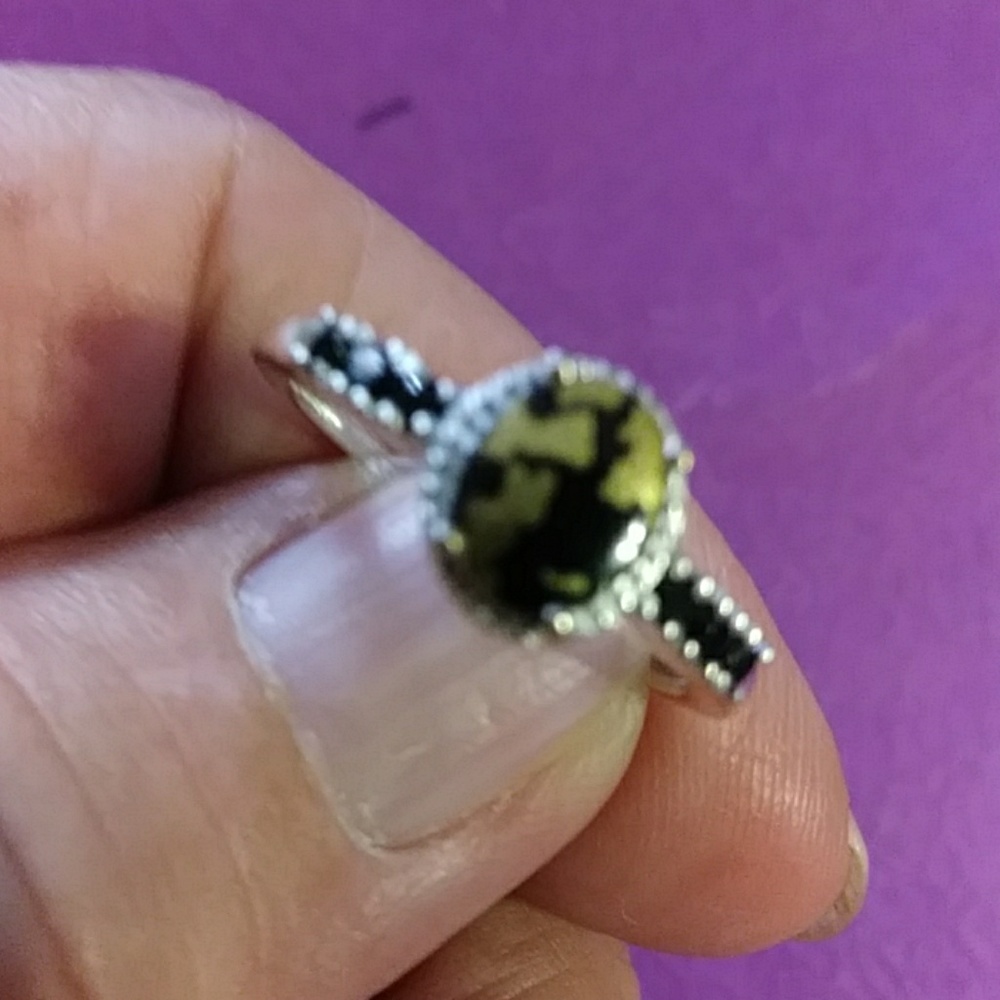 MEN'S UNIQUE GOLDENTINE WITH INDIVIDUALLY FACETED BLACK SPINEL.. RING- SZ. 9